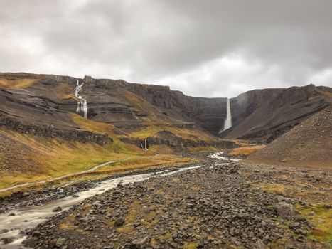 Litlanesfoss and Hengifoss waterfall in east Iceland long exposure during heavy rain