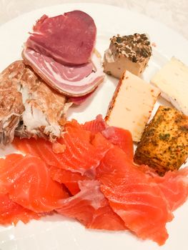 Traditional Icelandic breakfast cow tongue smoked trout sheep cheese salmon