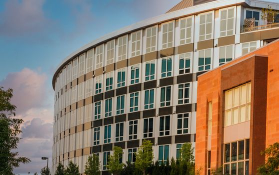 A modern five story curved office building in Denver, Colorado