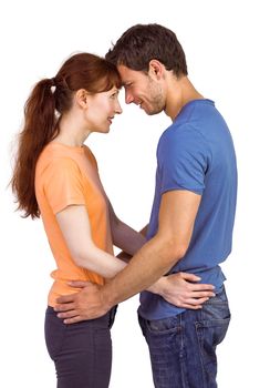 Couple looking at each other on white background