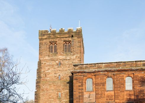 St Andrew's Church is an Anglican church situated in Penrith, Cumbria in northern England and is pictured on a winter morning.  The tower dates from the 12th and 13th century.