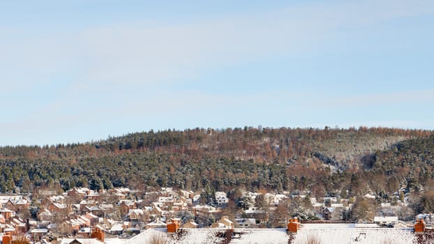 The view across the town of Penrith towards Beacon Hill in Cumbria, northern England pictured on a winter's morning.