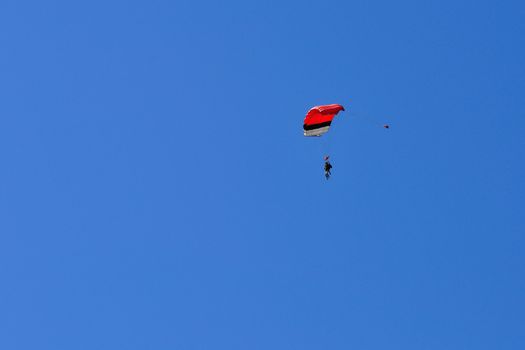 paragliding flight, France. pleasure of flying in a blue sky