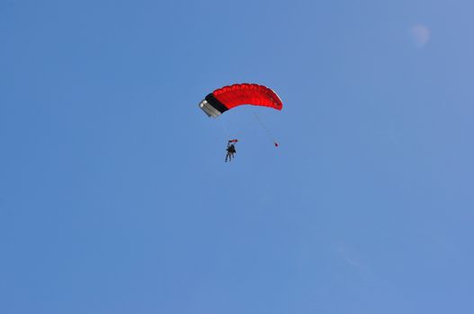 paragliding flight, France. pleasure of flying in a blue sky