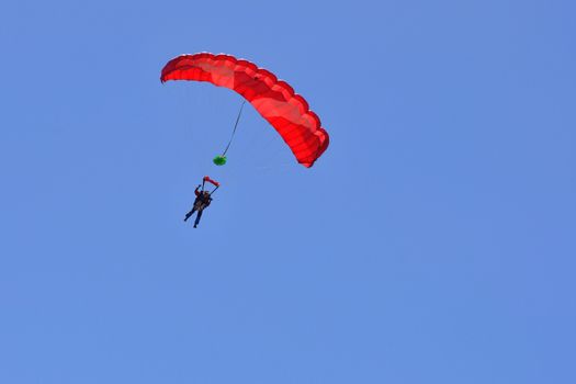 paragliding flight, France. pleasure of flying in a blue sky