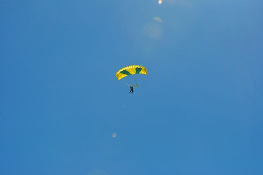 paragliding flight, France. pleasure of flying in a blue sky