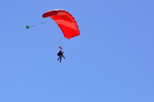 paragliding flight, France. pleasure of flying in a blue sky