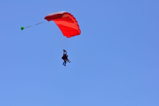 paragliding flight, France. pleasure of flying in a blue sky