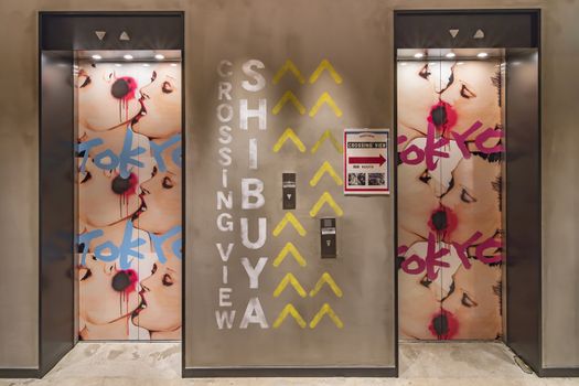 Elevator on the seventh floor of the 109 Mens building built in 1987 dedicated to men's fashion. This elevator covered with grafities illustrating the Tokyo fashion street leads to the Terrace Mag's Park renovated in 2018 which leads to Shibuya Crossing View, has a gazebo overlooking Shibuya's Pedestrian scramble.