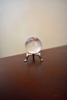 A clear quartz crystal ball