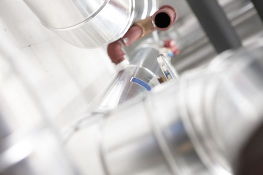 chrome pipes in heating and AC rooms in buildings of factories and hospital.. High key