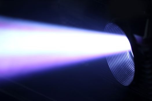 beamed light shining with a bright beam. With white and purple color