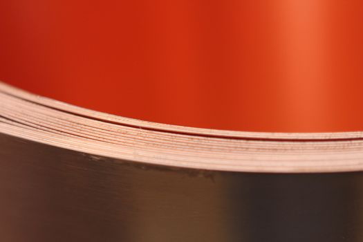 rolls of sheet metal in warehouse. With orange color