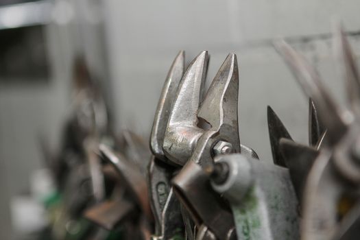 scissors for plumber to cut metal sheets and wires. Metal cutting tools