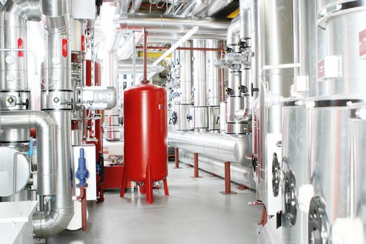 chrome pipes in heating and AC rooms in buildings of factories and hospital. Red and silver color