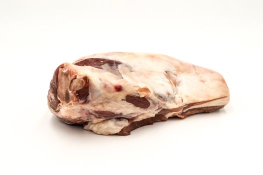 shoulder of fresh lamb on a white background