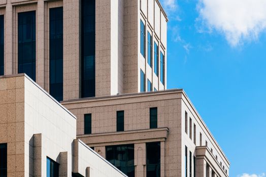 Old fashioned architecture details of building on sky background