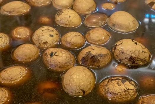 The close up of Taiwanese boiled tea eggs at Taiwan night market in Taipei.