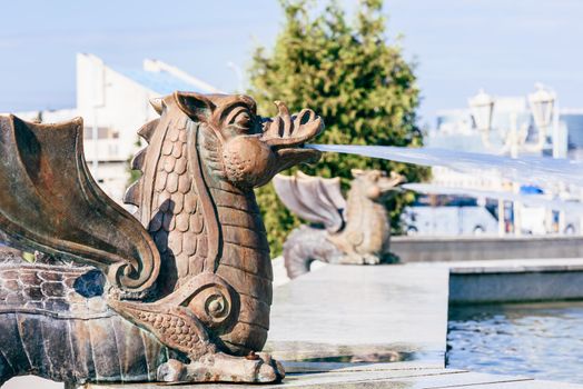 Bronze dragon fountain in park in Kazan, Russia