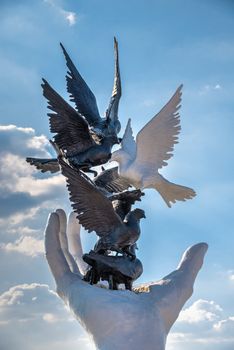 Kusadasi, Turkey – 07.18.2019.  Hand of Peace sculpture on the Kusadasi promenade in Turkey