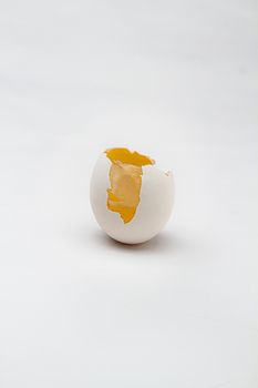 egg with top cracked open with inside skin showing