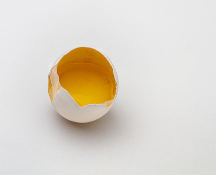 view from the top of a crack egg with inside skin showing