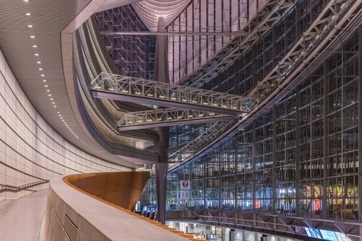 Inside view of Tokyo International Forum built in 1996 by Uruguayan architect Rafael Viñoly near Yurakucho station. It consists of 14 floors including 3 in the basement and consists of four buildings and a glass atrium. Its boat-like structure reveals its steel beams that contrast with its glass walls. Every year there are organized different events of classical music like "La folle Journée au Japon".