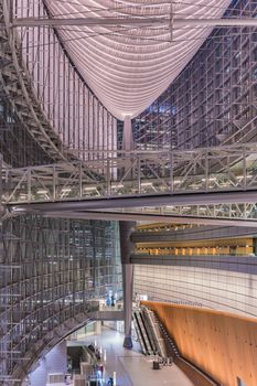 Inside view of Tokyo International Forum built in 1996 by Uruguayan architect Rafael Viñoly near Yurakucho station. It consists of 14 floors including 3 in the basement and consists of four buildings and a glass atrium. Its boat-like structure reveals its steel beams that contrast with its glass walls. Every year there are organized different events of classical music like "La folle Journée au Japon".