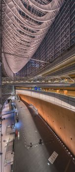 Inside view of Tokyo International Forum built in 1996 by Uruguayan architect Rafael Viñoly near Yurakucho station. It consists of 14 floors including 3 in the basement and consists of four buildings and a glass atrium. Its boat-like structure reveals its steel beams that contrast with its glass walls. Every year there are organized different events of classical music like "La folle Journée au Japon".