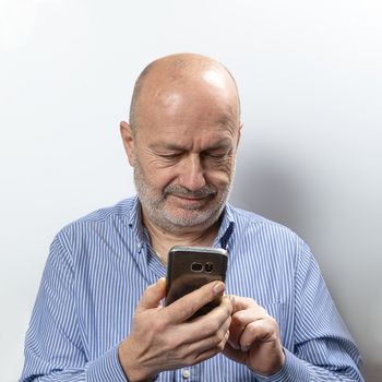 A middle-aged man during a cell phone conversation