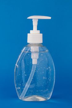 Hand sanitizer isolated on a blue background