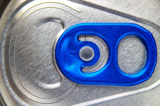 An unopen blue beer can tap ring closeup