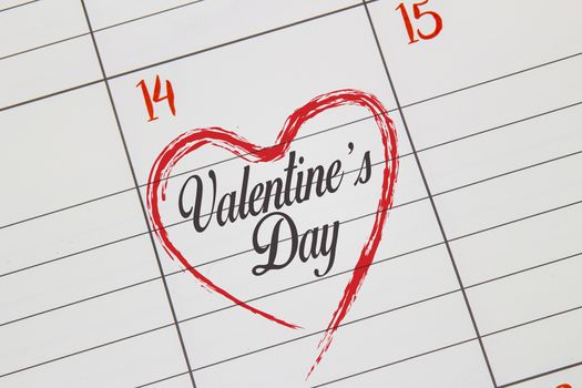 A close of a Calendar on Feb 14 with the text Valentine's Day inside of a heart