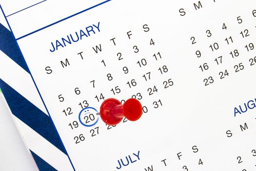 A Calendar on the third Monday of January is call Blue Monday with a red circle and pin