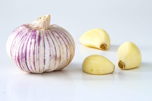 Isolated Fresh garlic. Raw garlics on a white background