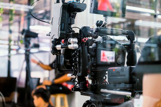 Film industry. Filming with professional camera background