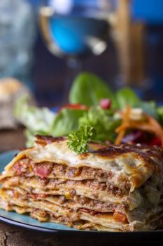 portion of fresh lasagna on a plate