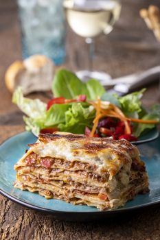 portion of fresh lasagna on a plate