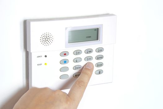 Home Alarm Panel to control security system with a person's hand