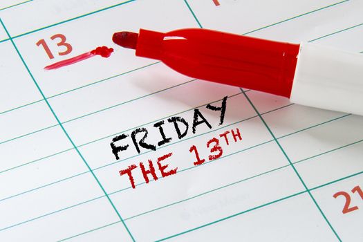 A Calendar on the Friday 13th day with a red marker