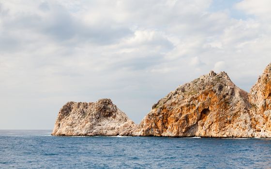 The rocky peninsula of Alanya as viewed from the Mediterranean Sea.  Alanya is a resort in southern Turkey.