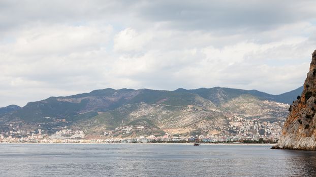 Cleopatra beach and the city of Alanya in Turkey viewed from the Mediterranean Sea.