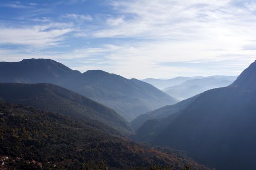 View of misty fog mountains in Arcadia, Greece.