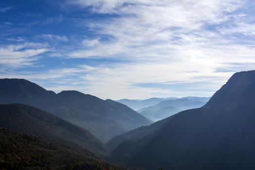 View of misty fog mountains in Arcadia, Greece.