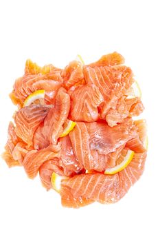 Pieces of red fish on an isolated studio background