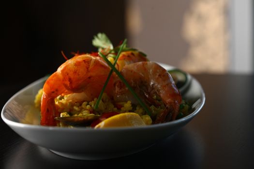 dish with shrimp and vegetable on a table top