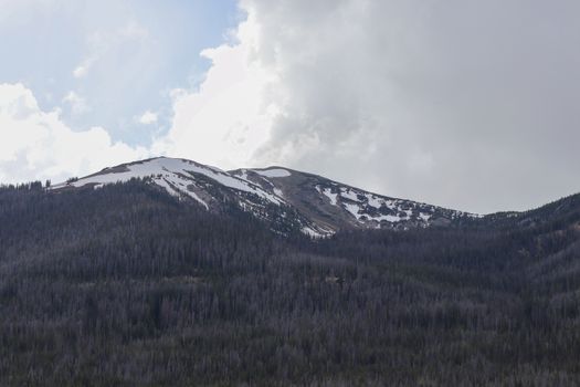 A sign on the side of a mountain. High quality photo