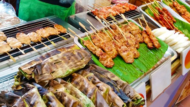 Traditional Thai style grilled in banana leaf and meat stick