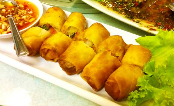 Fried Chinese Traditional Spring rolls chili sauce.
