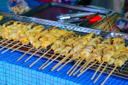 Grilled squid at street food bangkok,Thailand